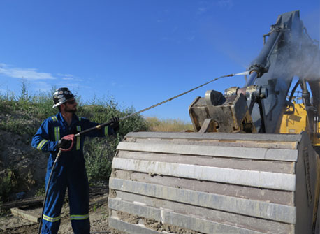 pressure washing heavy equipment